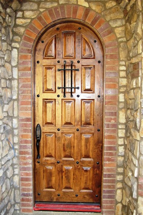 Somerton hill is a traditionally styled door that can adapt to a range of decorating styles, from formal to casual. Tuscan Distressed Exterior Door wth Clavos - Mediterranean ...