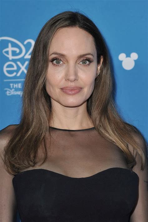 Actress, director, screen writer, and loving partner. Angelina Jolie - D23 Disney+ Event in Anaheim 08/24/2019 ...