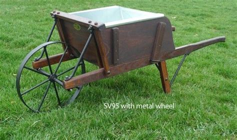 Old Fashioned Reproduction Wood And Metal Spoke Wheelbarrows Atelier