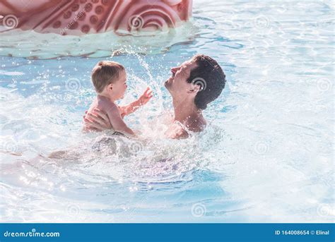 Father With Son In The Swimming Pool Father S Day Parent Stock Photo