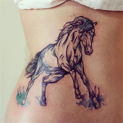 A Womans Stomach With A Horse Tattoo On It