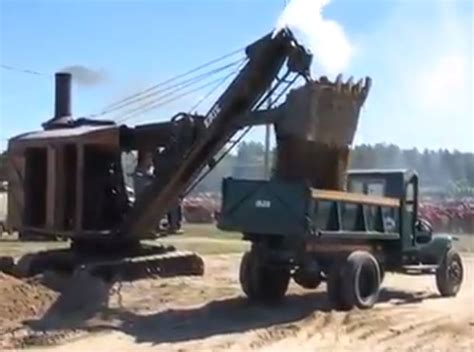 Watch The Process Of An Erie Steam Shovel Loading Trucks