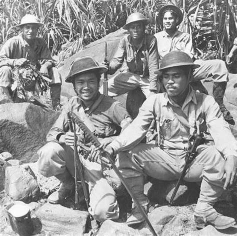 Ww2 Japanese Soldier Philippine Soldiers Holding Japanese Sword
