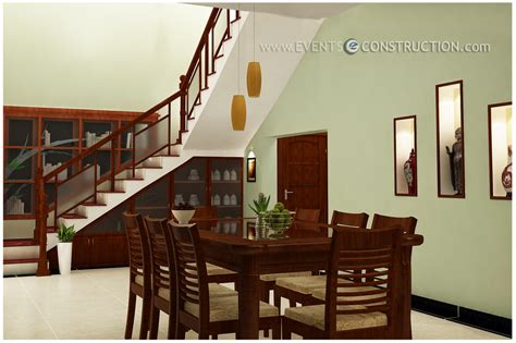 Evens Construction Pvt Ltd: Dining area designed under staircase