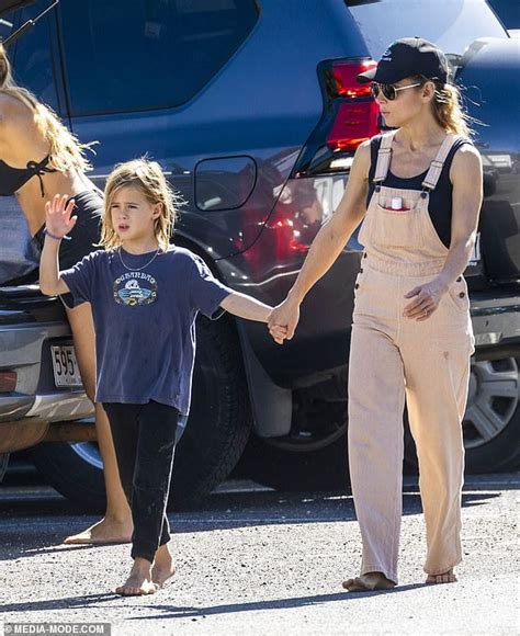 Elsa Pataky Flaunts Her Biceps In A Black Singlet As She Steps Out With Her Husband Chris