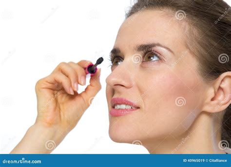 Portrait Of Young Woman Applying Mascara Stock Image Image Of Visage