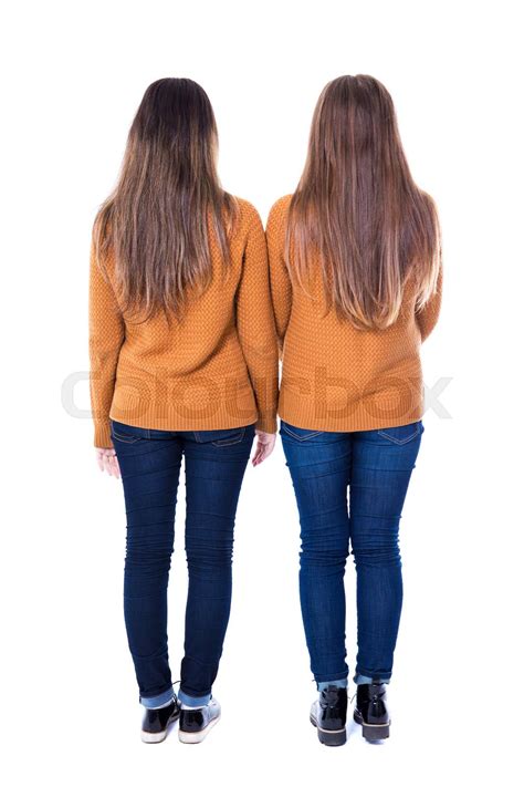 Friendship Concept Back View Of Two Girls Standing Isolated On White