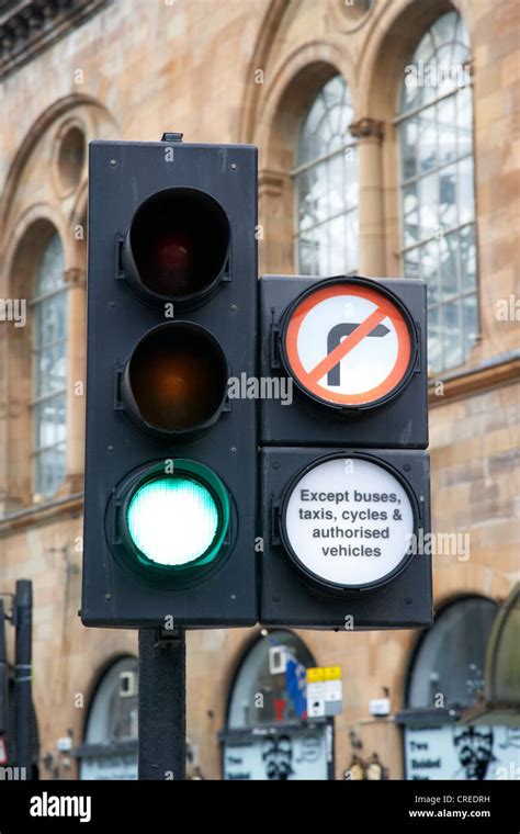 Green Traffic Light Signal With No Right Turn Except Buses Taxis Cycles