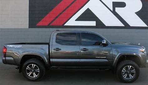 Pre-Owned 2018 Toyota Tacoma 4WD TRD Sport Double Cab Truck in Orange