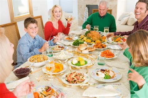 At dinner a few nights ago, my children told me all about a very. A caucasian family enjoying their Christmas dinner | Stock Photo | Colourbox