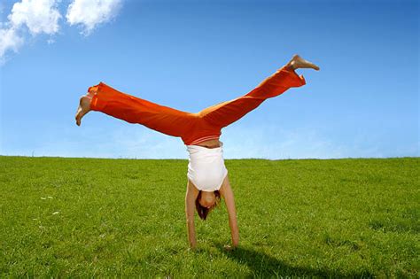 610 Woman Cartwheel Stock Photos Pictures And Royalty Free Images Istock