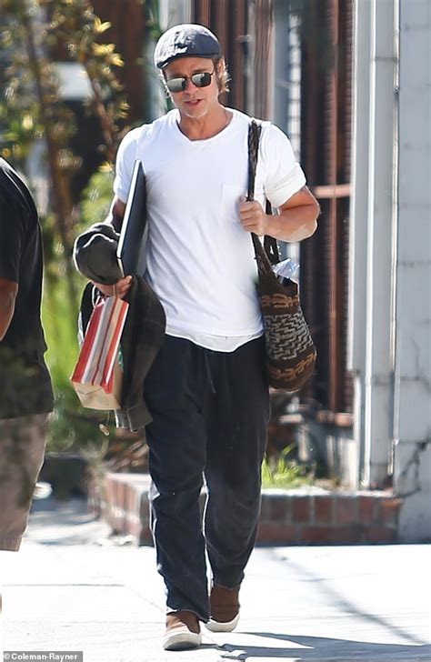 Brad Pitt Has His Hands Full On Casual Stroll In La Weeks Before Court