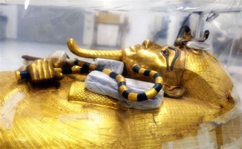 golden touch up king tutankhamun s coffin undergoes first ever restoration at new grand