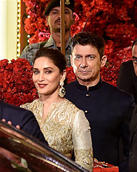 Bollywood Actress Madhuri Dixit Wore A Gold Outfit Isha Ambanis Wedding Dresses Popsugar
