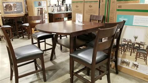Gorgeously rich and deep in the combined hues of classic black and warm and welcoming brown, the roslyn table set offers a casual and comfortable look that other kitchen and dining ensembles should surely aspire to. Costco Bayside Counter Height Table Round / Square with 6 ...