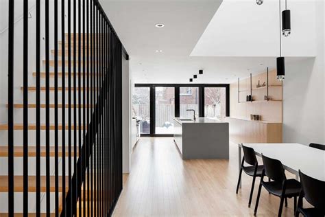 Row House Renovated With Modern Interiors And Triple Height Space
