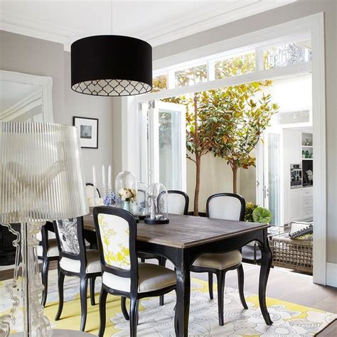 Yellow And Black Dining Room With French Dining Table
