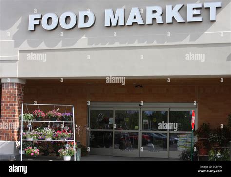 A Grocery Store Or Food Market Front Door To Go Shopping In Stock Photo