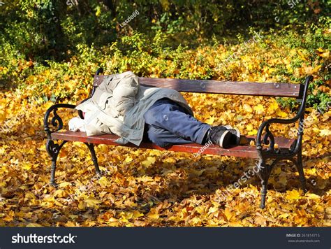 Homeless Man Sleeping On Park Bench Stock Photo 261814715 Shutterstock