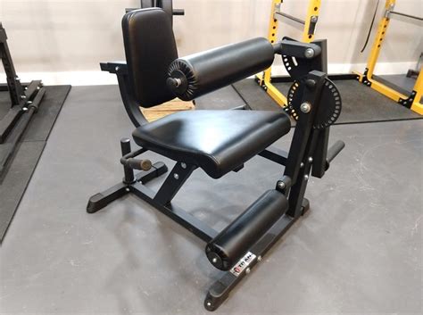 Titan Fitness Seated Leg Curl And Extension Machine Review Reviews By