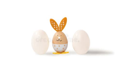 Easter Bunny And Perfectly Shaped White Chicken Eggs Isolated On A
