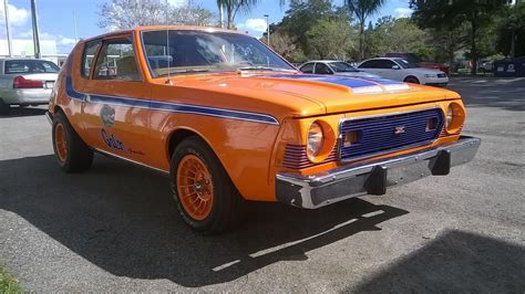 1974 amc gremlin x an economical, sporty subcompact built by american motors this car is finished in sienna orange (paint code g6) with black body side stripes and rear panel insert with. 1975 AMC Gremlin | J218 | Kissimmee 2018