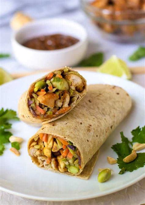 These healthy chicken wraps, are so light, cool, and refreshing that you literally cannot stop eating them! Asian Chicken Wraps with Thai Peanut Sauce