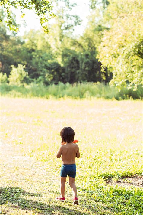 Babe Eating Watermelon Outdoors By Stocksy Contributor Lumina Stocksy