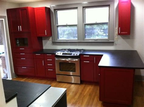 This photo gallery has pictures of kitchens featuring red kitchen cabinets in modern styles. Cardinal red kitchen cabinets