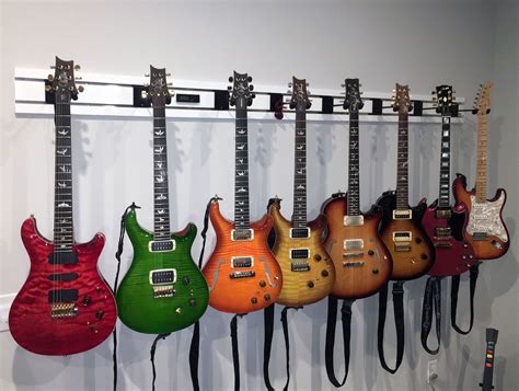Guitar hanging system used in home for guitar storage and display | Guitar hanger, Guitar ...