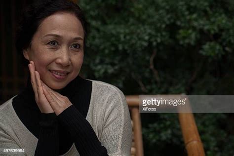 Mature Asian Women Fotos Photos And Premium High Res Pictures Getty Images