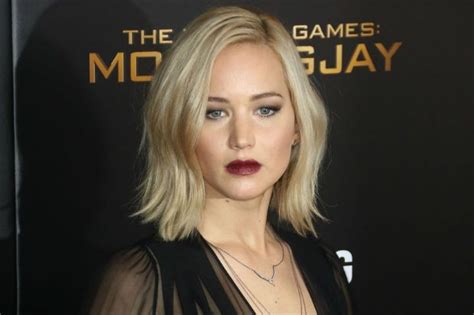 Jennifer Lawrence Vamps It Up In Sheer Black Dress And Dark Lipstick For Mockingjay Part 2