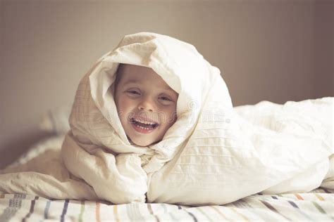 Young Boy On Bed Stock Photo Image Of Head Morning 99527302