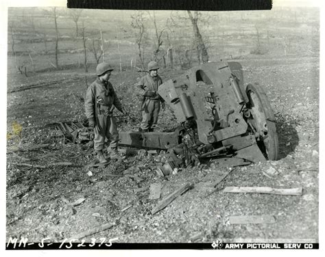 Us Soldiers Examine Remains Of Demolished German Artillery Weapon On 11