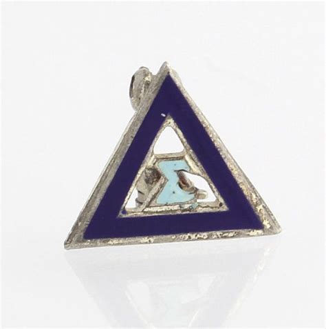 This Vintage Pledge Pin Features A Dark Blue Enameled Delta With A