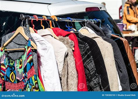 Rack Of Female Second Hand Clothes For Donation Or Charity Stock Photo