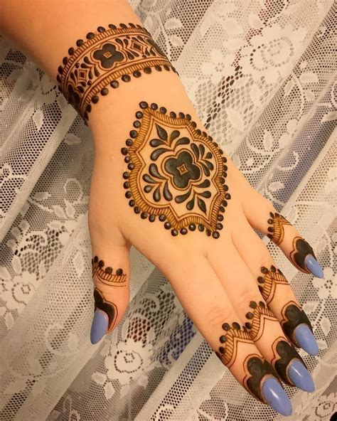 Image May Contain One Or More People And Closeup Indian Mehndi Designs