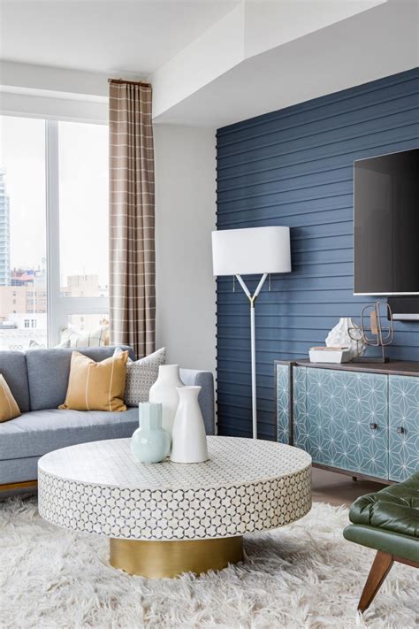 Midcentury Modern Living Room With Blue Accent Wall Hgtv