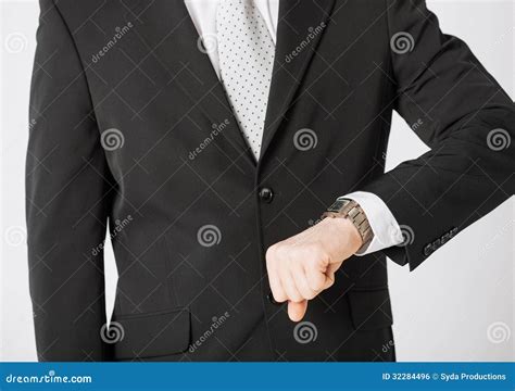 Man Looking At Wristwatch Stock Photo Image Of Occasion 32284496