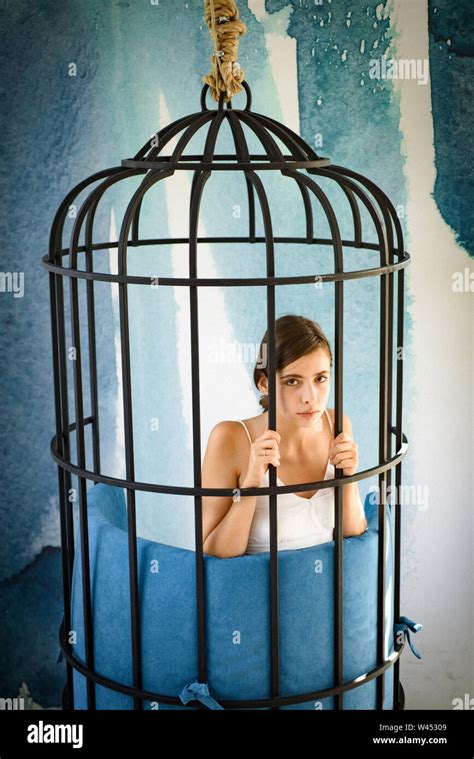 Freedom Of Cute Girl In Cage Got Something On Her Mind Woman In Iron