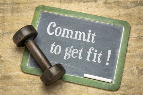 Commit To Be Fit Motivation Concept On Blackboard Stock Photo Image