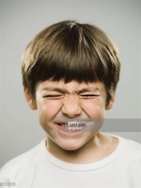 Young Boy With Disgust Facial Expression High Res Stock Photo Getty