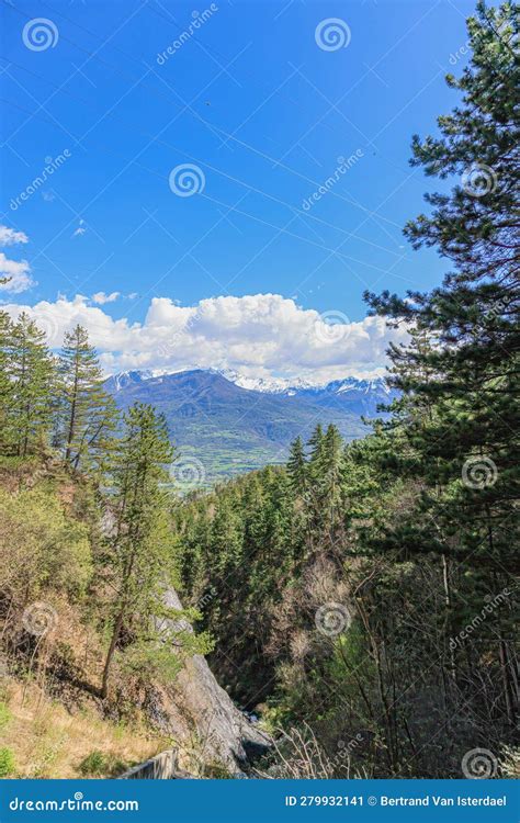 A Scenic View Of A Forest Mountain With Some Power Line And Mountain