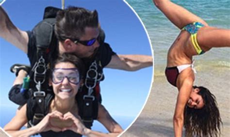 Nina Dobrev Skydives Before Displaying Sexy Handstand Pose On The Beach