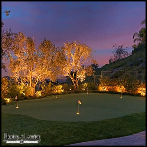 Outdoor putting green turf is designed to withstand the elements, and won't fade in the sun. Backyard Putting Green Lighting - Hooks & Lattice