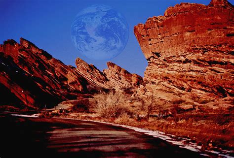 Full Earth Over Red Rocks Photograph By Kellice Swaggerty