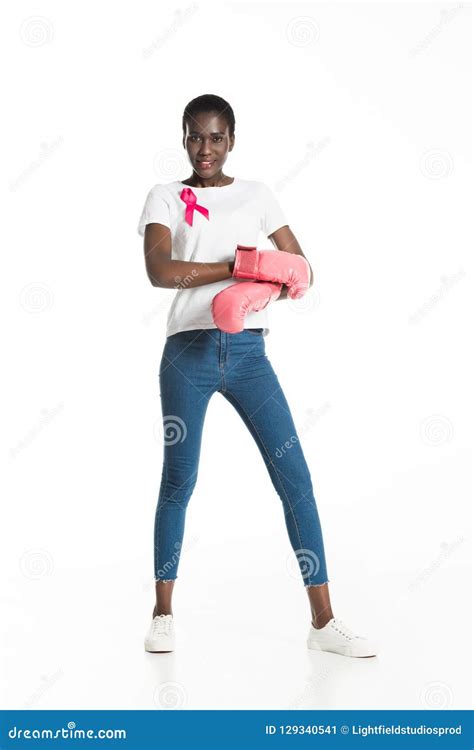 Full Length View Of Young Woman With Pink Ribbon Wearing Boxing Gloves