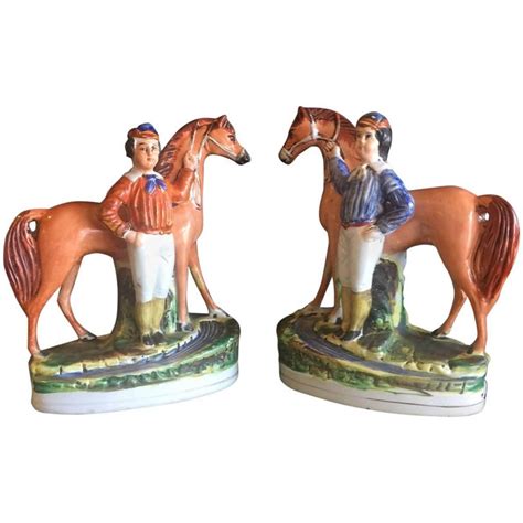 Pair Of 19th Century Porcelain Horse And Riderjockey Figurines By