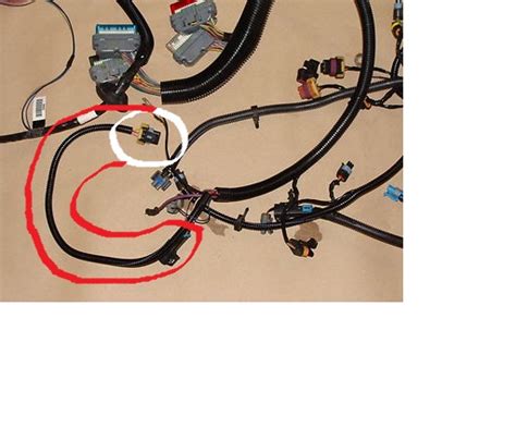The painless wire harness kit should contain the following items blk lt.blu dk.blu brn pur ylw grn wht. Please ID this plug on 96 Engine Harness - LS1TECH