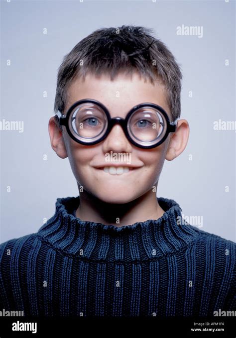 Portrait Of A Goofy Young Boy Wearing Thick Glasses Stock Photo